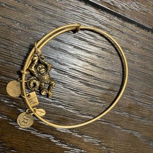 Daughter has grown out of these bracelets with charms so it your gain